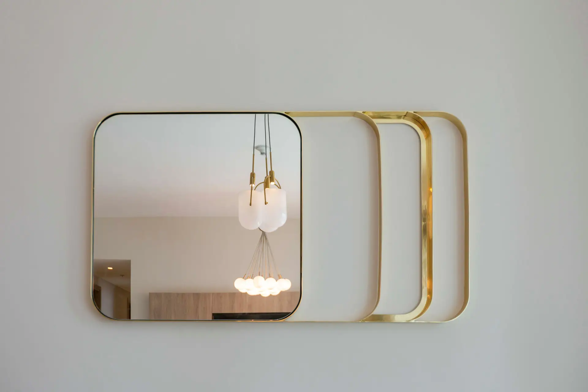 BrunelloVarique interior detailing with gold mirror and warm ambient lighting