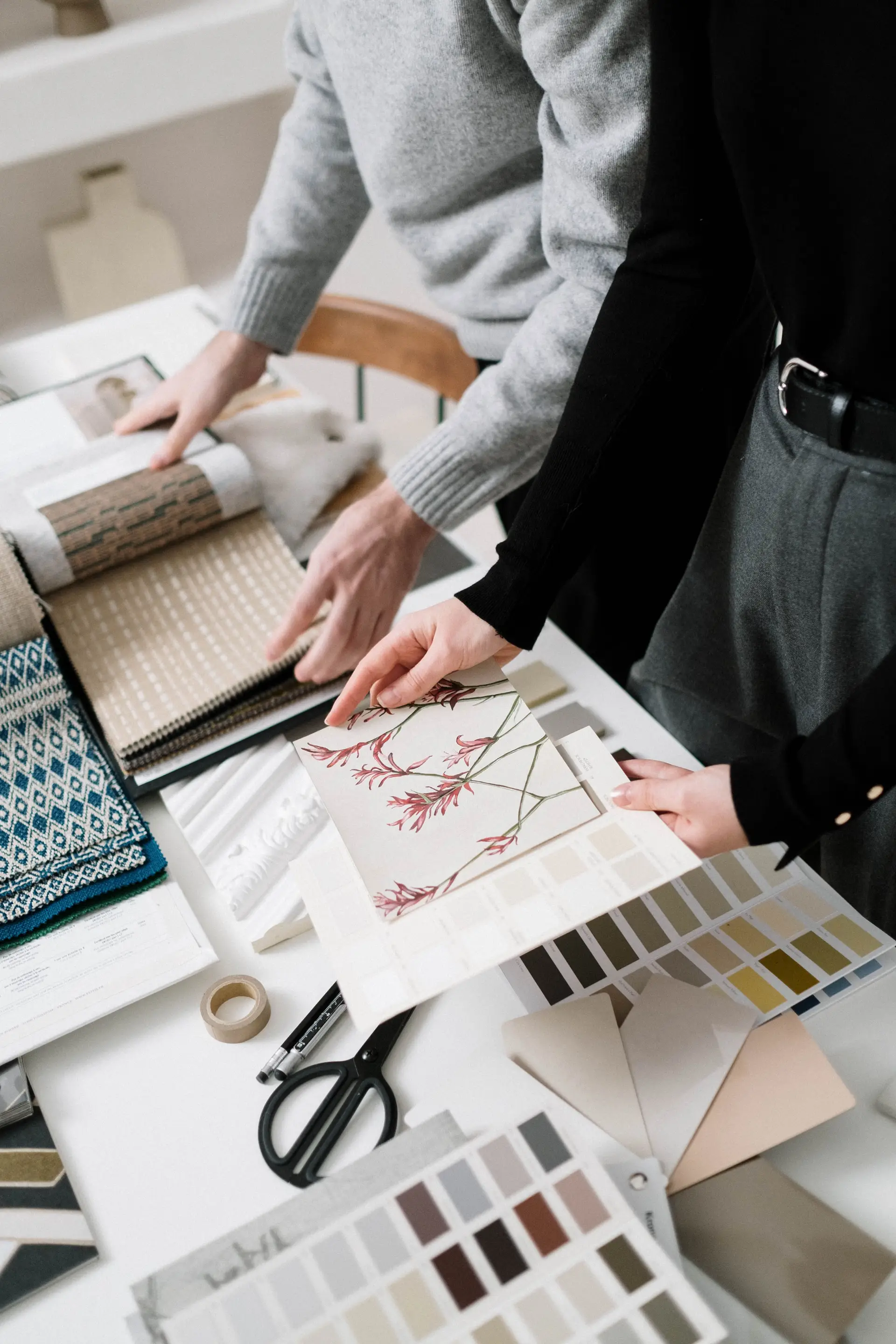 BrunelloVarique interior designers working with textile samples
