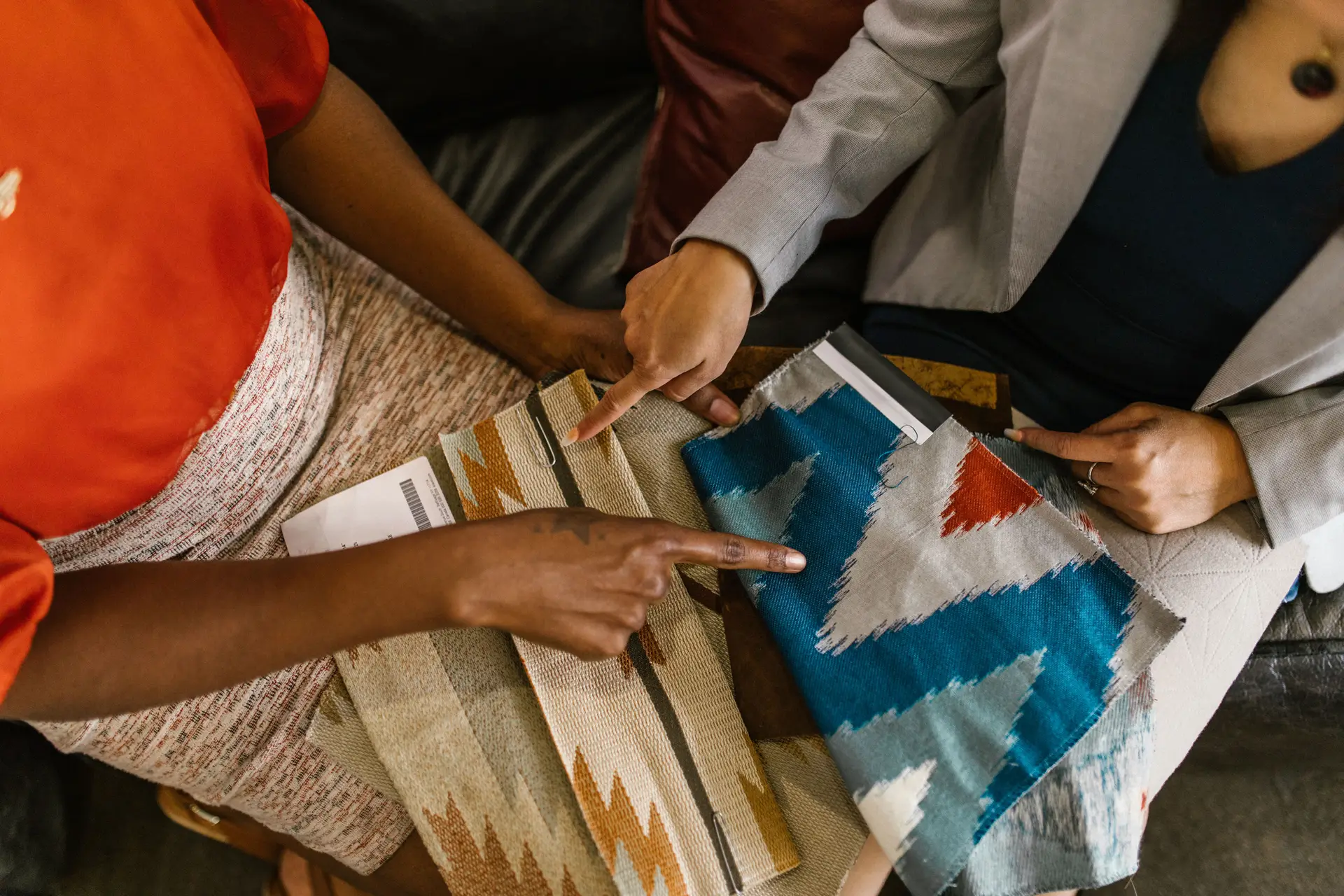 Reviewing handwoven textiles and wool upholstery samples